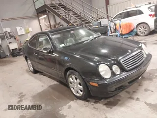 2002 Mercedes-Benz CLK 320/430 z VIN WDBLJ65G32T126811, wystawiony jako IAAI lot #41705955 z przebiegiem 194 164 mil mil oraz . Historia ofert i sprzedaży dostępna na DreamBid. Obrazek 1.
