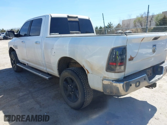 2016 Ram 2500 SLT with VIN 3C6UR5DLXGG209185, listed as a IAAI auction lot 41814628 with 298,573 mi miles. Bid and sale history available at carsss.com. Image 3.