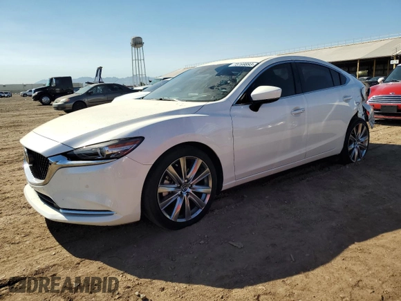 2021 Mazda 6 Signature with VIN JM1GL1XY5M1614601, listed as a Copart auction lot 73769893 with 22,617 mi miles and . Bid and sale history available at DreamBid. Image 1.