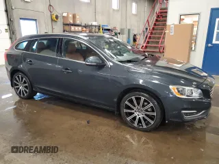 2015 Volvo V60 z VIN YV1612SC8F1212622, wystawiony jako Copart lot #58492135 z przebiegiem 114 137 mil mil oraz Tytuł czysty. Historia ofert i sprzedaży dostępna na DreamBid. Obrazek 4.
