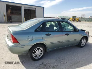 2003 Ford Focus SE with VIN 1FAFP34P63W294459, listed as a Copart auction lot 49710355 with 69,449 mi miles and Salvage Title. Bid and sale history available at carsss.com. Image 3.