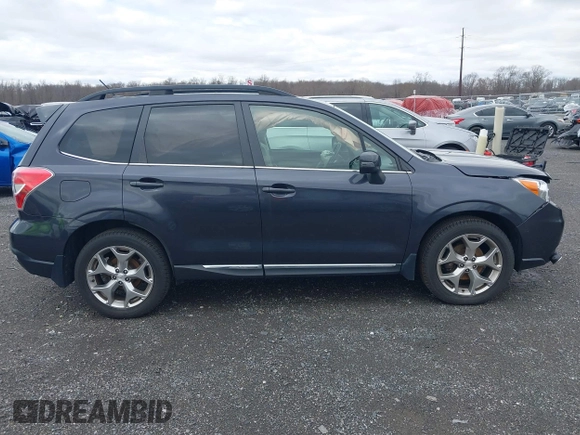 2015 Subaru Forester Touring with VIN JF2SJAWC0FH585722, listed as a IAAI auction lot 41734016 with 90,728 mi miles and . Bid and sale history available at DreamBid. Image 13.