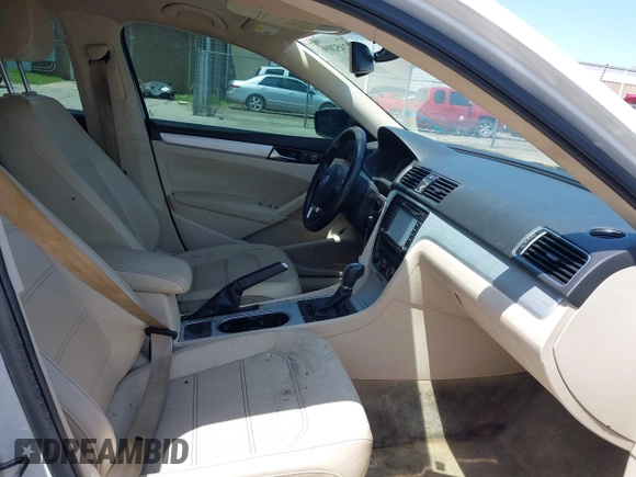 2013 Volkswagen Passat SE with VIN 1VWBP7A32DC007863, listed as a IAAI auction lot 42452096 with 207,083 mi miles and . Bid and sale history available at DreamBid. Image 5.