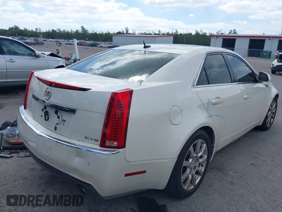 2008 Cadillac CTS RWD with VIN 1G6DV57V880128535, listed as a IAAI auction lot 39097540 with 153,140 mi miles and . Bid and sale history available at DreamBid. Image 4.