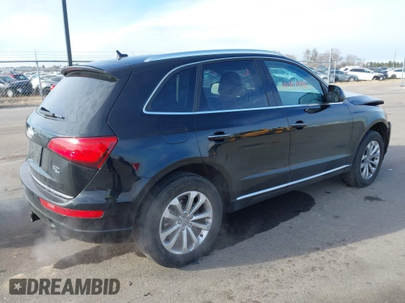 2015 Audi Q5 Premium with VIN WA1CFAFP1FA030479, listed as a IAAI auction lot 40957493 with 103,805 mi miles. Bid and sale history available at carsss.com. Image 4.