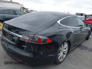 2017 Tesla Model S 100D with VIN 5YJSA1E26HF197176, listed as a IAAI auction lot 42565791 with 120,287 mi miles and . Bid and sale history available at DreamBid. Image 4.