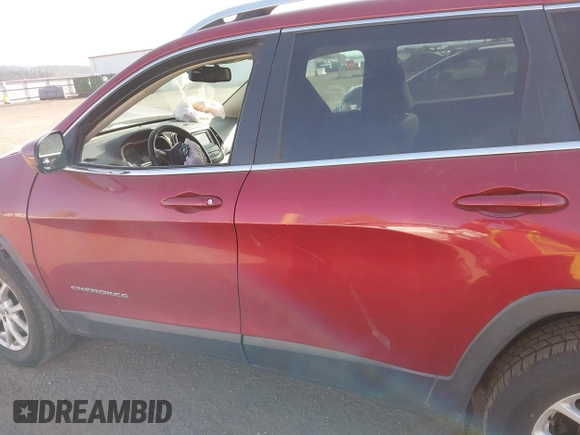 2016 Jeep Cherokee Latitude with VIN 1C4PJMCS8GW250318, listed as a IAAI auction lot 42126241 with 105,028 mi miles. Bid and sale history available at carsss.com. Image 15.