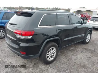 2020 Jeep Grand Cherokee Altitude with VIN 1C4RJEAG7LC113542, listed as a IAAI auction lot 41485511 with 58,927 mi miles and . Bid and sale history available at DreamBid. Image 4.