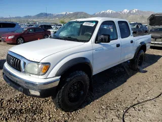 2002 Toyota Tacoma PreRunner with VIN 5TEGN92NX2Z121828, listed as a Copart auction lot 55698815 with 212,022 mi miles and Salvage title. Bid and sale history available at DreamBid. Image 1.