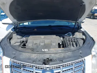 2013 Cadillac SRX Performance Collection with VIN 3GYFNDE33DS637155, listed as a IAAI auction lot 41977706 with 140,668 mi miles and . Bid and sale history available at DreamBid. Image 10.