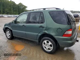 2002 Mercedes-Benz M-Class with VIN 4JGAB54EX2A313793, listed as a Copart auction lot 72600614 with 140,053 mi miles and Salvage Title. Bid and sale history available at carsss.com. Image 2.