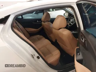 2016 Nissan Maxima SL with VIN 1N4AA6AP2GC399721, listed as a IAAI auction lot 41818252 with 64,386 mi miles and . Bid and sale history available at DreamBid. Image 8.
