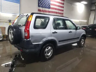 2002 Honda CR-V LX with VIN JHLRD68512C009941, listed as a Copart auction lot 87699075 with 133,311 mi miles and Salvage Title. Bid and sale history available at DreamBid. Image 3.