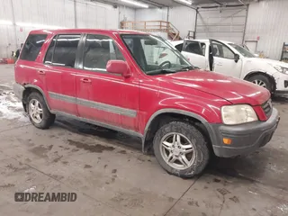 2000 Honda CR-V EX with VIN JHLRD1861YC009880, listed as a IAAI auction lot 41613882 with 238,499 mi miles. Bid and sale history available at carsss.com. Image 1.