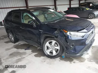 2020 Toyota RAV4 Hybrid Limited with VIN 2T3DWRFV5LW053459, listed as a IAAI auction lot 42006765 with 87,452 mi miles. Bid and sale history available at carsss.com. Image 1.