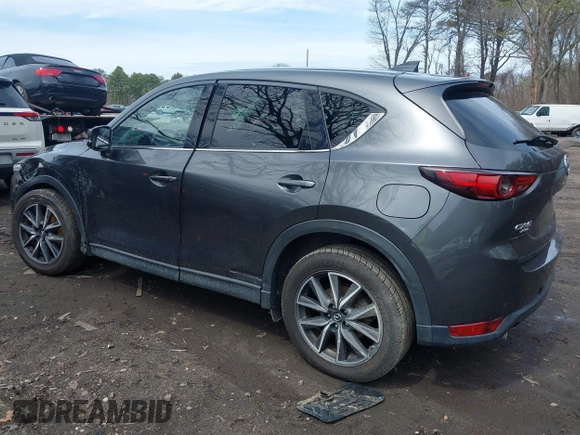 2018 Mazda CX-5 Grand Touring with VIN JM3KFBDM6J0388540, listed as a IAAI auction lot 41963726 with 103,148 mi miles. Bid and sale history available at carsss.com. Image 3.