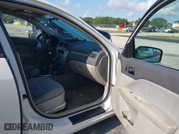 2012 Ford Fusion S with VIN 3FAHP0GA5CR121825, listed as a IAAI auction lot 42203716 with 138,717 mi miles and . Bid and sale history available at carsss.com. Image 5.