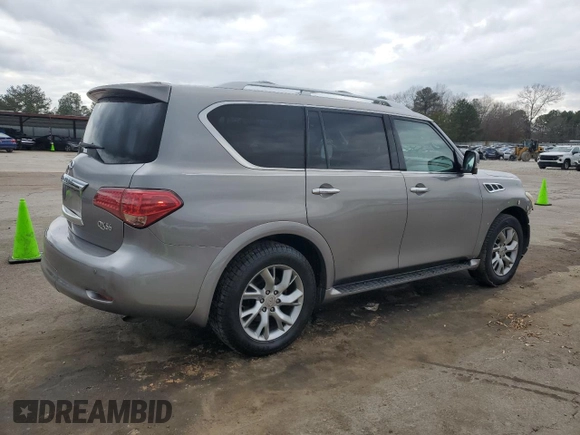 2012 Infiniti QX56 8-passenger with VIN JN8AZ2ND4C9715207, listed as a Copart auction lot 43283955 with 191,935 mi miles and Salvage title. Bid and sale history available at DreamBid. Image 3.