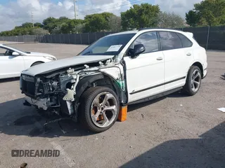 2022 Bentley Bentayga V8 z VIN SJAAM2ZV2NC013035, wystawiony jako IAAI lot #41487773 z przebiegiem 35 500 mil mil oraz . Historia ofert i sprzedaży dostępna na DreamBid. Obrazek 2.