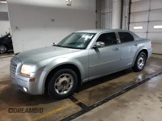 2005 Chrysler 300 with VIN 2C3JA53G65H556313, listed as a Copart auction lot 51839305 with 124,358 mi miles and Salvage Title. Bid and sale history available at carsss.com. Image 1.