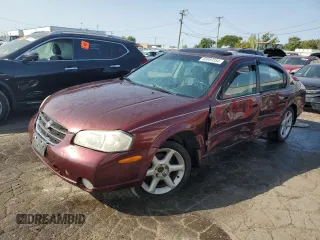 2001 Nissan Maxima SE 20th Anniversary. z VIN JN1CA31A31T314926, wystawiony jako Copart lot #69869354 z przebiegiem Nie podano mil oraz Szkoda całkowita • Salvage title. Historia ofert i sprzedaży dostępna na DreamBid. Obrazek 1.
