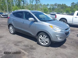 2013 Hyundai Tucson GLS with VIN KM8JU3AC4DU588062, listed as a IAAI auction lot 42080348 with 76,937 mi miles. Bid and sale history available at carsss.com. Image 1.