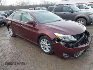 2015 Toyota Avalon Limited with VIN 4T1BK1EB8FU160935, listed as a IAAI auction lot 41487381 with 105,273 mi miles and . Bid and sale history available at DreamBid. Image 1.