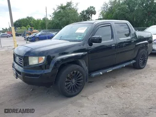 2007 Honda Ridgeline RTL w/Leather with VIN 2HJYK16527H515539, listed as a IAAI auction lot 42100067 with 186,864 mi miles. Bid and sale history available at carsss.com. Image 2.