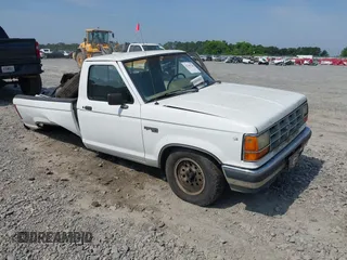 1990 Ford Ranger XL z VIN 1FTCR10A9LUC11065, wystawiony jako IAAI lot #42295784 z przebiegiem 25 384 mil mil oraz . Historia ofert i sprzedaży dostępna na DreamBid. Obrazek 1.