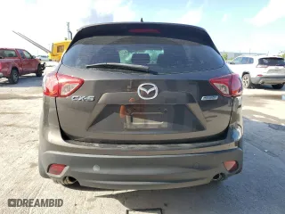 2016 Mazda CX-5 Sport with VIN JM3KE2BY5G0662568, listed as a Copart auction lot 51613115 with 0 mi miles and Non Repairable. Bid and sale history available at carsss.com. Image 6.