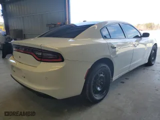 2022 Dodge Charger Police with VIN 2C3CDXKG5NH153873, listed as a Copart auction lot 82989944 with 23,862 mi miles and Salvage Title. Bid and sale history available at carsss.com. Image 3.