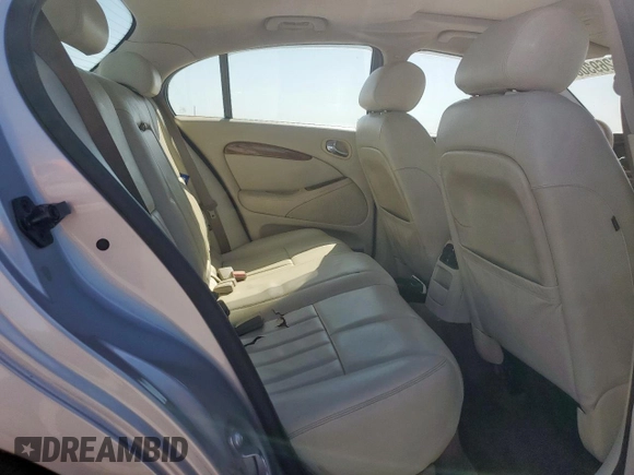 2003 Jaguar S-Type with VIN SAJEA01T43FM62477, listed as a Copart auction lot 52693085 with 109,761 mi miles and Salvage Title. Bid and sale history available at DreamBid. Image 10.