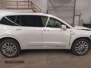 2022 Cadillac XT6 Premium Luxury with VIN 1GYKPDRS3NZ131095, listed as a IAAI auction lot 42087620 with 36,740 mi miles and . Bid and sale history available at DreamBid. Image 14.