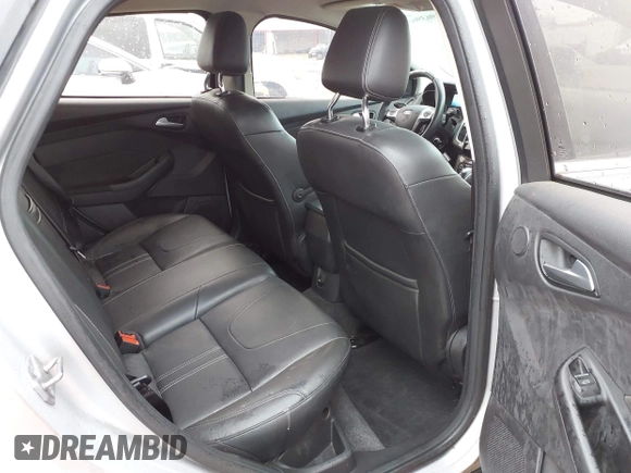 2012 Ford Focus SEL with VIN 1FAHP3H22CL102110, listed as a IAAI auction lot 41963966 with 151,538 mi miles. Bid and sale history available at carsss.com. Image 8.