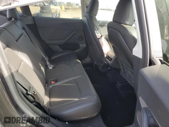2024 Tesla Model Y with VIN 7SAYGDED7RF163537, listed as a Copart auction lot 48639255 with 7,193 mi miles and Salvage Title. Bid and sale history available at DreamBid. Image 11.