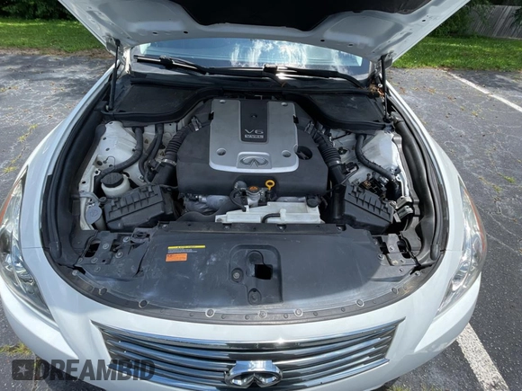 2014 Infiniti Q60 Journey с VIN JN1CV6EKXEM110777, выставлен на аукционе Copart как лот 60266245 с пробегом 128 272 миль миль и Чистый • Clean title. История ставок и продаж доступна на DreamBid. Изображение 7.