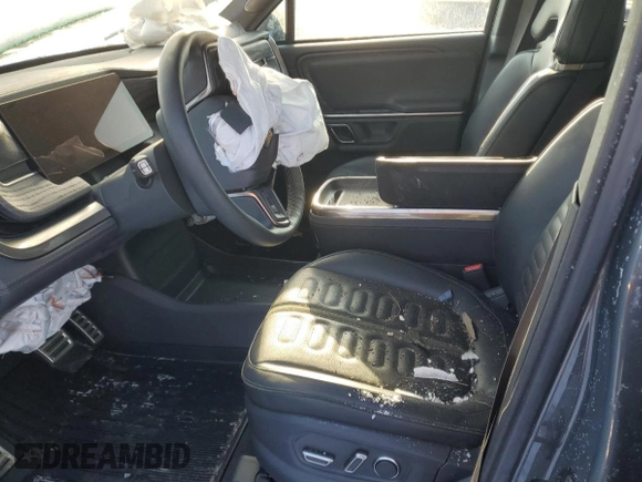 2024 Rivian R1S Adventure z VIN 7PDSGABA1RN043089, wystawiony jako Copart lot #43860515 z przebiegiem Nie podano mil oraz Nie do naprawy. Historia ofert i sprzedaży dostępna na DreamBid. Obrazek 7.