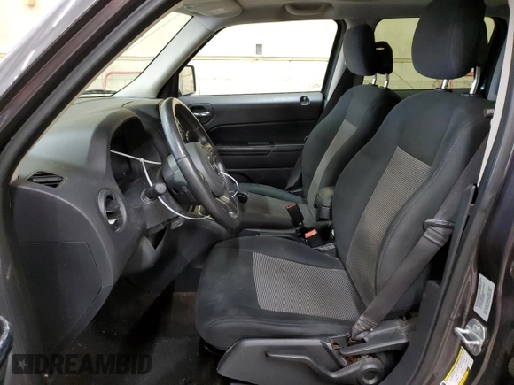 2015 Jeep Patriot Latitude with VIN 1C4NJPFB3FD353256, listed as a Copart auction lot 43928265 with 153,574 mi miles and Salvage Title. Bid and sale history available at DreamBid. Image 7.