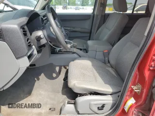 2006 Jeep Commander z VIN 1J8HG48K76C131681, wystawiony jako Copart lot #64386985 z przebiegiem 142 135 mil mil oraz Szkoda całkowita • Salvage title. Historia ofert i sprzedaży dostępna na DreamBid. Obrazek 7.