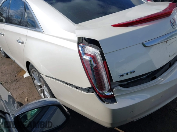 2014 Cadillac XTS Premium with VIN 2G61P5S38E9124277, listed as a IAAI auction lot 41744734 with 136,223 mi miles. Bid and sale history available at carsss.com. Image 6.