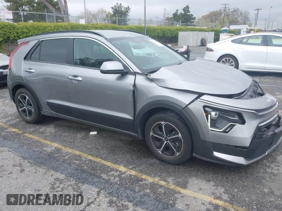 2023 Kia Niro LX with VIN KNDCP3LE5P5090549, listed as a IAAI auction lot 41874882 with 25,894 mi miles. Bid and sale history available at carsss.com. Image 1.