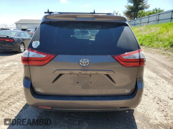 2015 Toyota Sienna Limited z VIN 5TDDK3DCXFS114353, wystawiony jako Copart lot #54853855 z przebiegiem 162 633 mil mil oraz Tytuł czysty. Historia ofert i sprzedaży dostępna na DreamBid. Obrazek 6.
