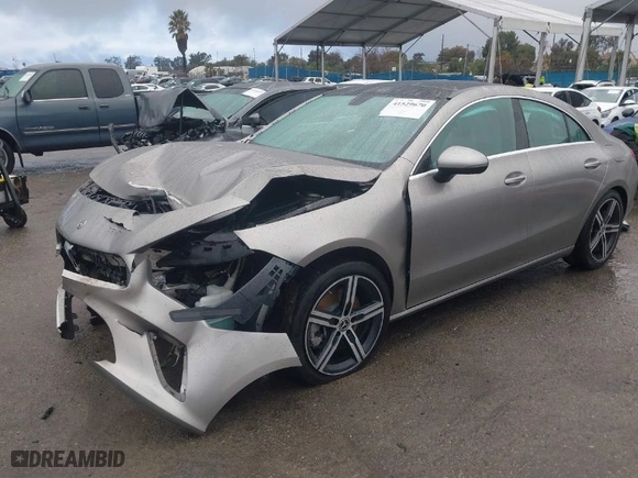 2020 Mercedes-Benz CLA with VIN WDD5J4GB6LN077972, listed as a IAAI auction lot 41529670 with 90,356 mi miles. Bid and sale history available at carsss.com. Image 2.