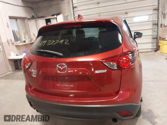 2013 Mazda CX-5 Touring with VIN JM3KE4CEXD0120913, listed as a IAAI auction lot 41973792 with 129,202 mi miles. Bid and sale history available at carsss.com. Image 16.