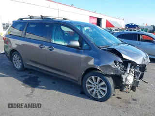 2017 Toyota Sienna LE with VIN 5TDJZ3DC2HS154993, listed as a IAAI auction lot 41372165 with 151,300 mi miles. Bid and sale history available at carsss.com. Image 1.