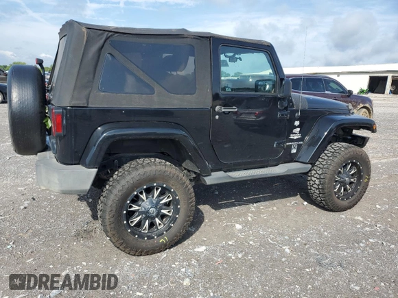 2011 Jeep Wrangler Sahara with VIN 1J4AA5D15BL552185, listed as a Copart auction lot 63065185 with 159,850 mi miles and Salvage title. Bid and sale history available at DreamBid. Image 3.