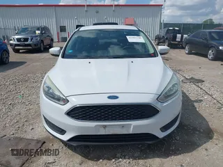 2015 Ford Focus SE with VIN 1FADP3F2XFL335884, listed as a IAAI auction lot 42582740 with 102,036 mi miles and . Bid and sale history available at DreamBid. Image 12.