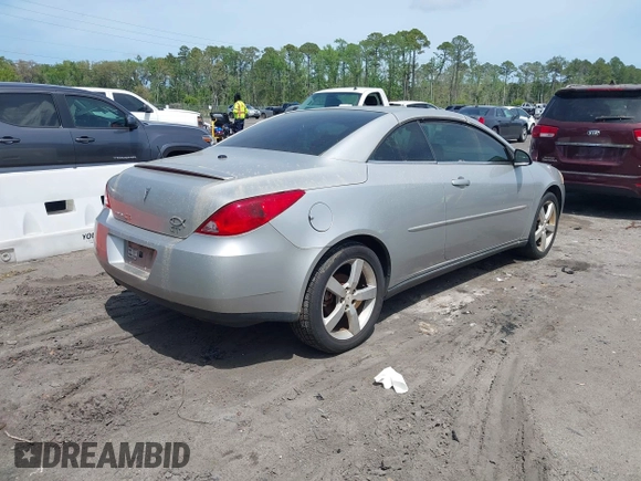 2006 Pontiac G6 GT with VIN 1G2ZH358364273262, listed as a IAAI auction lot 41963147 with 128,440 mi miles and . Bid and sale history available at DreamBid. Image 4.