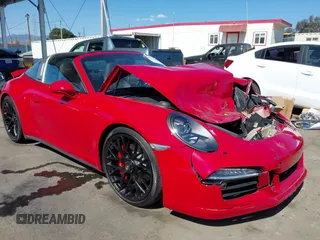 2016 Porsche 911 4S z VIN WP0BB2A99GS136573, wystawiony jako IAAI lot #42238845 z przebiegiem 13 464 mil mil oraz . Historia ofert i sprzedaży dostępna na DreamBid. Obrazek 1.