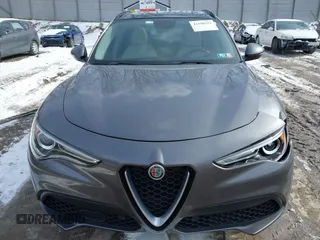 2019 Alfa Romeo Stelvio z VIN ZASPAKAN5K7C49428, wystawiony jako IAAI lot #41590351 z przebiegiem 60 052 mil mil oraz . Historia ofert i sprzedaży dostępna na DreamBid. Obrazek 13.